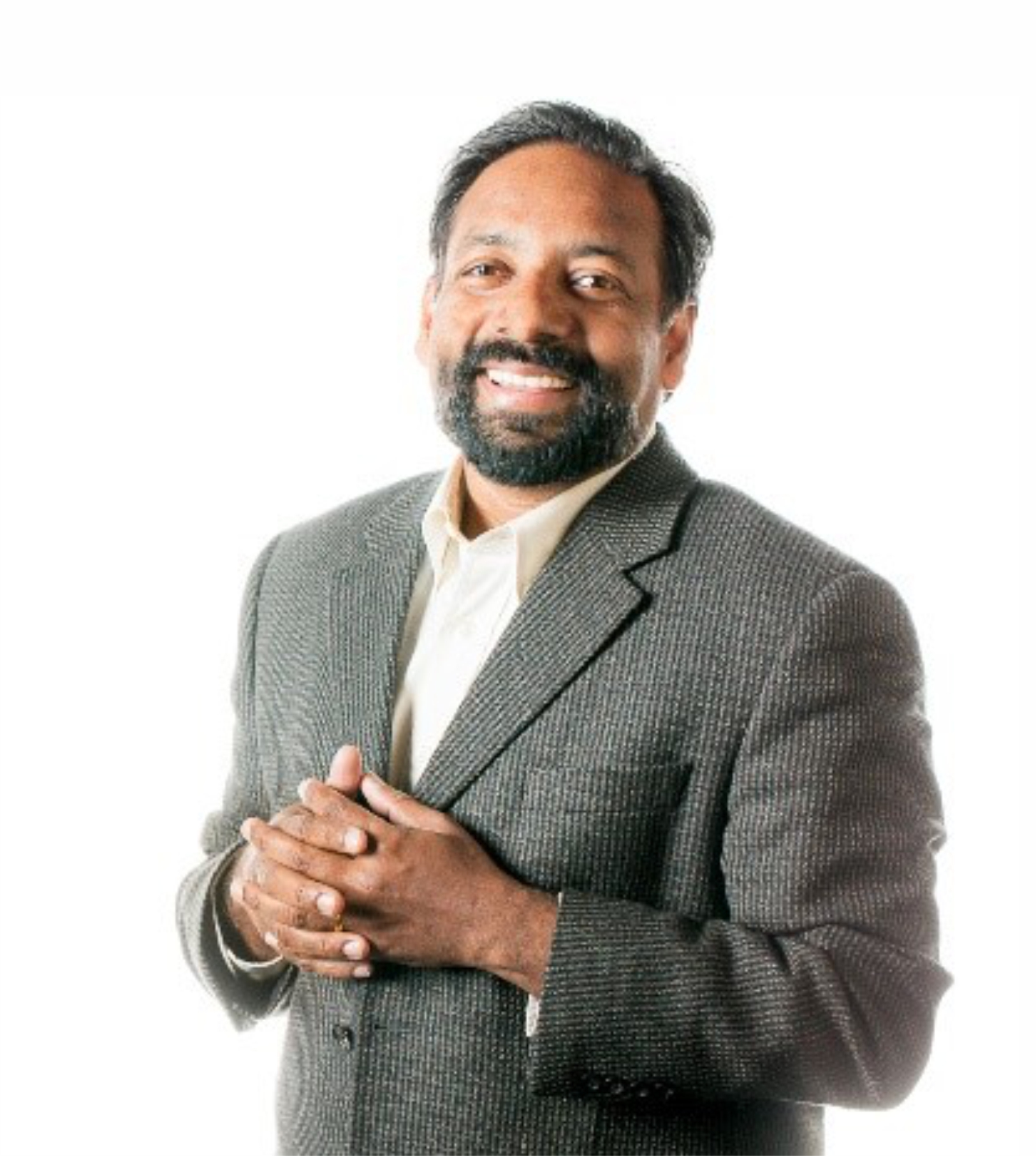 Smiling bearded man in gray suit, portrait photo on white background